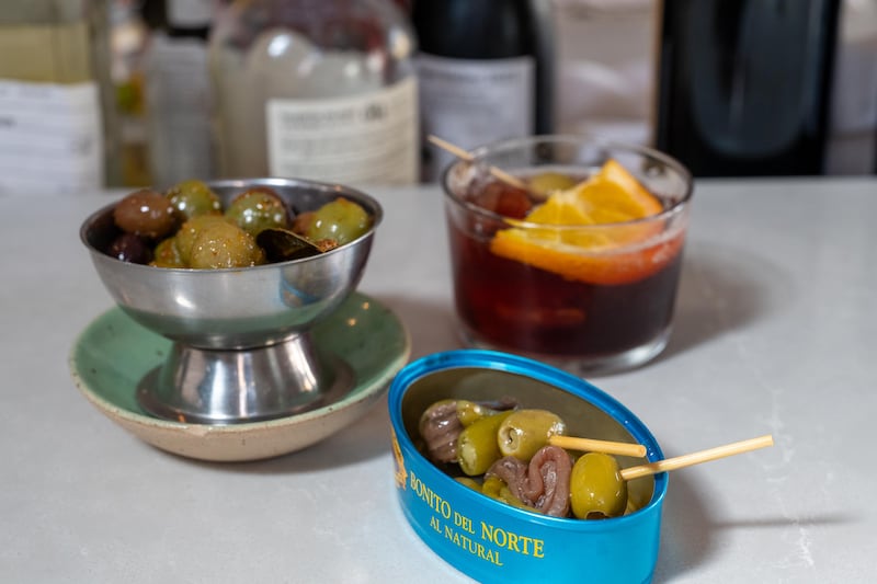 Gilda, an aperitivo of marinated olives, peppers  and anchovies with vermouth at Saint Francis Provisions. Photograph: John Allen