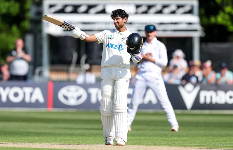 New Zealand’s Rachin Ravindra celebrates after scoring a century. Photograph: Nick Elliott/Inpho