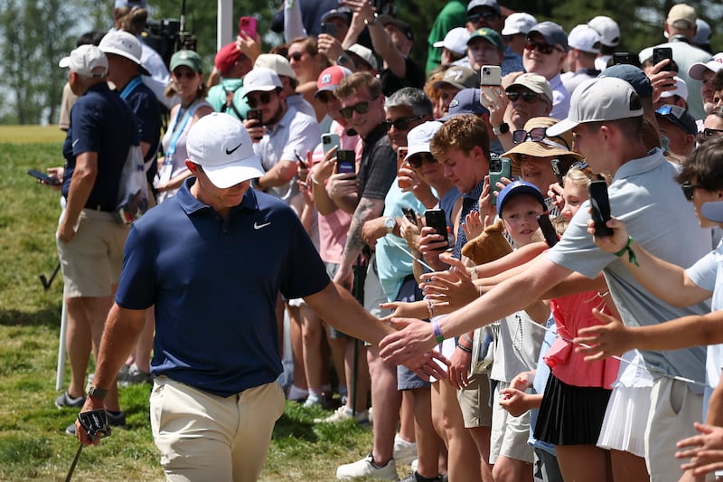 Rory McIlroy greets fans. Photograph: Emilee Chinn/Getty