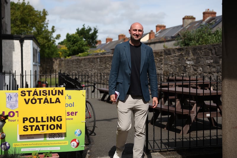 Social Democrat candidate Daniel Ennis arrives at the polling station to cast his ballot on Friday. Photograph: Enda O'Dowd