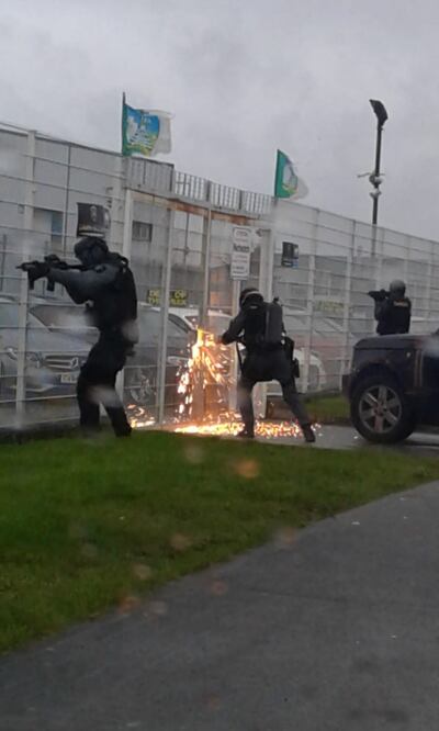 The Criminal Assets Bureau (Cab) with the assistance of Garda teams conducting a search operation on the Limerick garage in March 2019. Photograph: Cab/Facebook