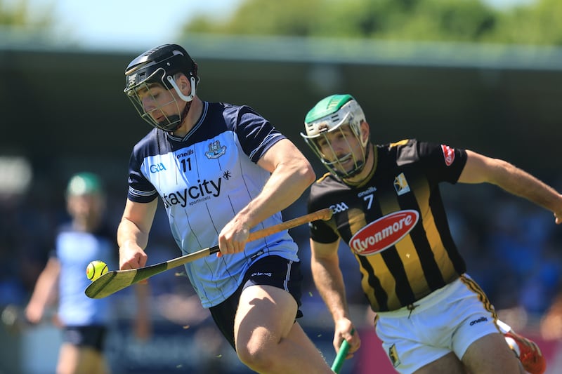Dublin's Donal Burke and Paddy Deegan of Kilkenny at Parnell Park on Sunday. Photograph: Bryan Keane/Inpho