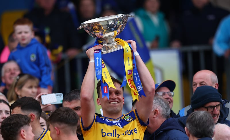 Roscommon Enda Smith lifts the Nestor Cup. Photograph: James Crombie/Inpho 