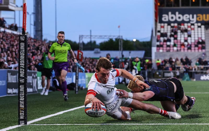Ethan McIlroy Ulster's third try despite Glasgow's Kyle Steyn. Photograph: Ben Brady/Inpho