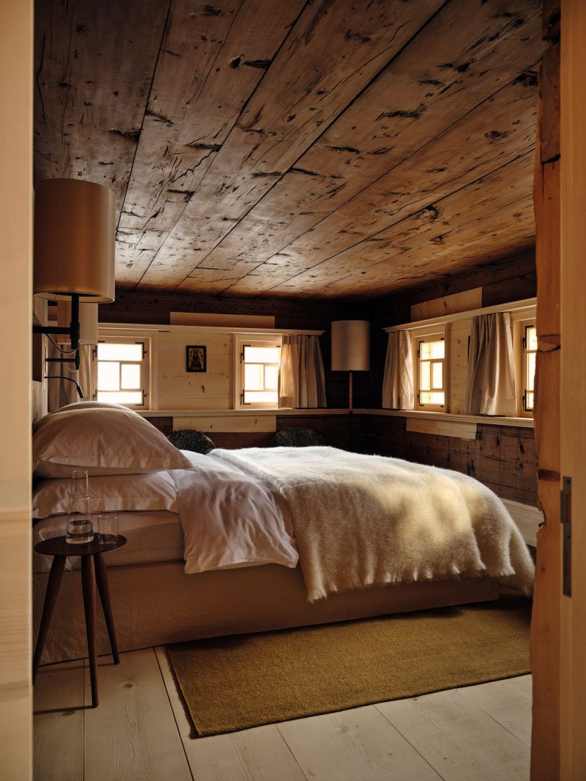 Bedroom with wooden walls