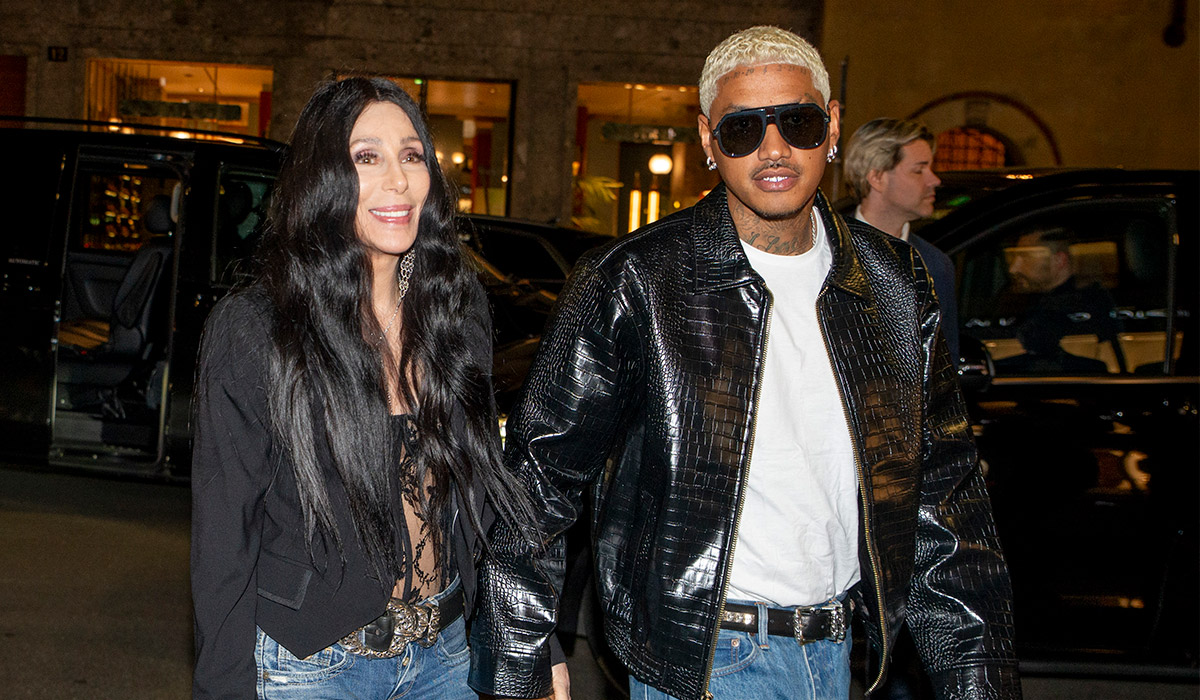 The American singer Cher with Alexander Edwards at the Dolce & Gabbana party for the preview of the exhibition From the heart to the hands at Palazzo Reale. Pic: Getty Images