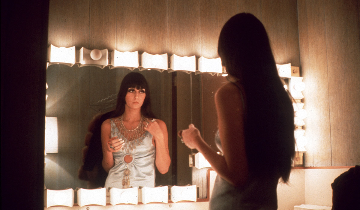 Entertainer Cher fixes her make up in a dressing room mirror in March 1968 in Los Angeles. Pic: Getty Images
