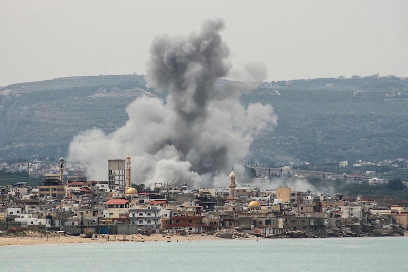 Smoke rising from the site of an Israeli air strike that targeted the area of Ras Al-Ain on Tuesday. Israel has intensified its attacks in south Lebanon. Photograph: Kawnat Haju/AFP/Getty Images