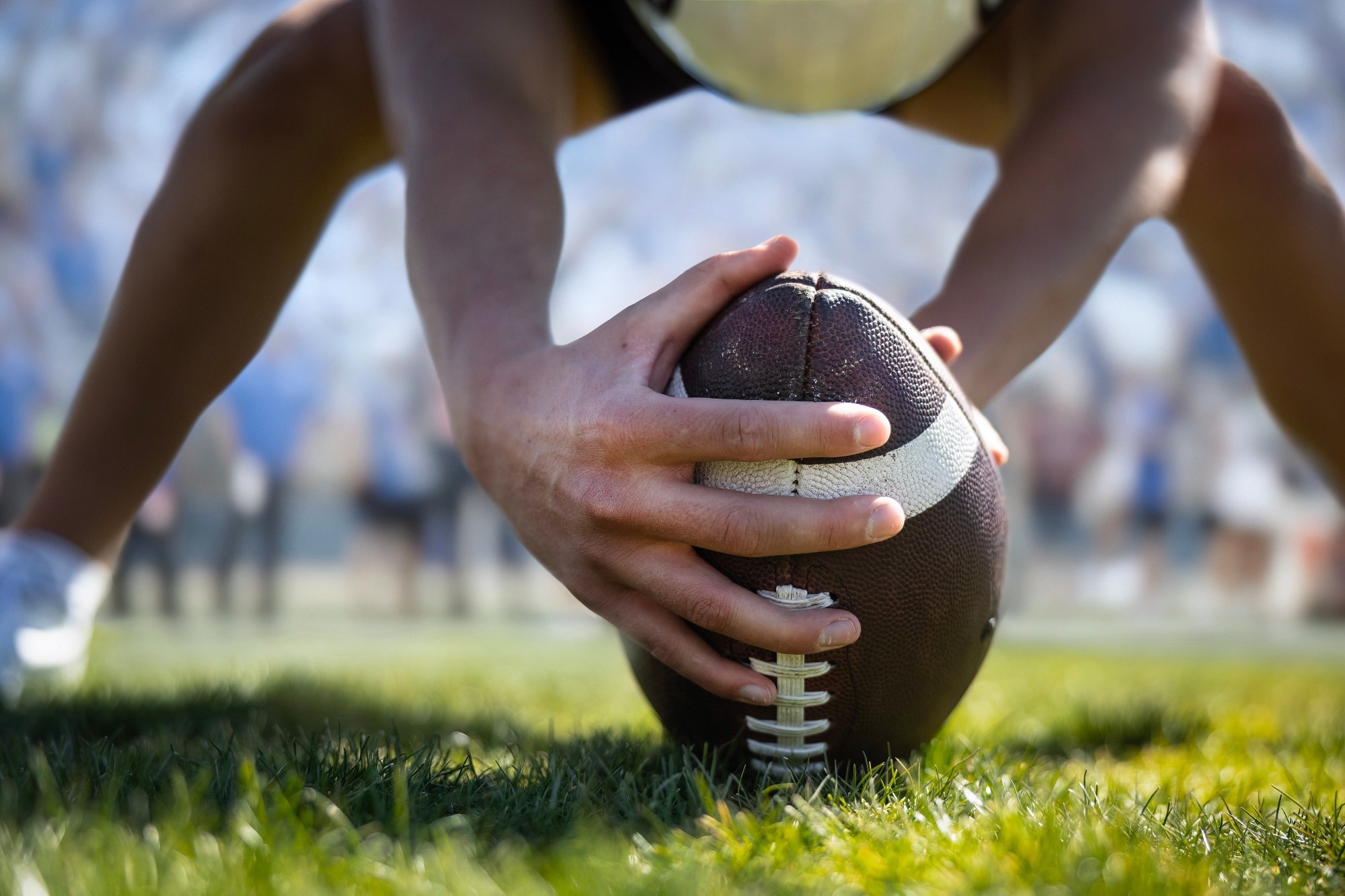 Study: Non-concussive head impacts sustained during American football correlate with changes in gut microbiome diversity and composition. Image Credit: Brocreative / Shutterstock