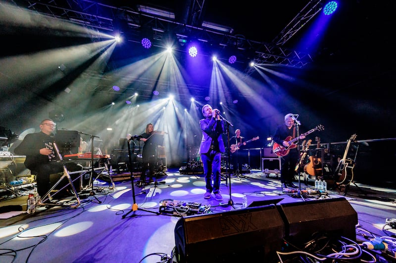 Neil Hannon performs with Ian Watson, Andrew Skeet, Lucy Wilkins, Tim Weller, Simon Little and Tosh Flood in Milan, Italy. Photograph: Sergione Infuso/Corbis via Getty Images