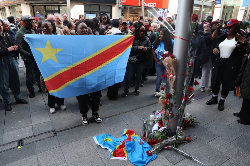 People take part in the vigil on Henry Street. Photograph: Stephen Collins/Collins