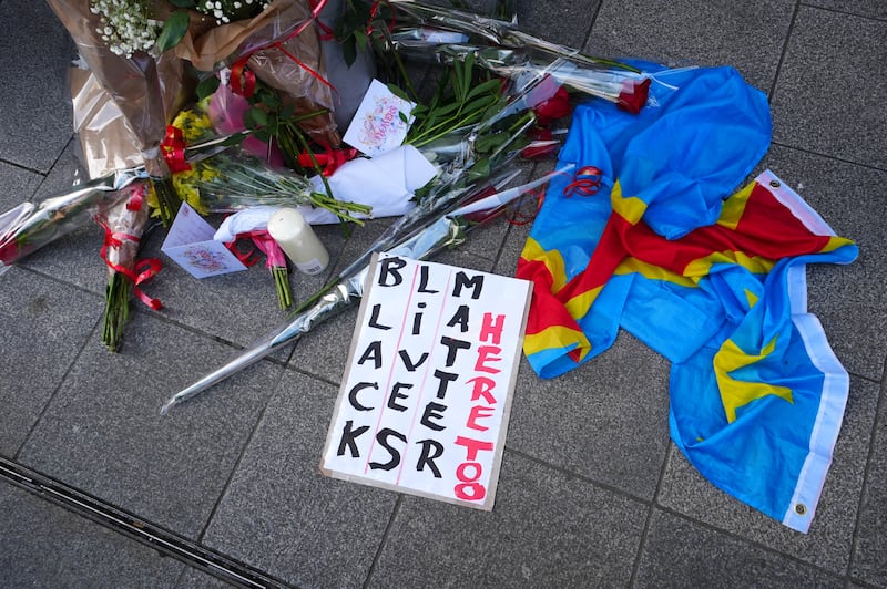 Flowers left at the vigil. Photograph: Brian Lawless/PA Wire
