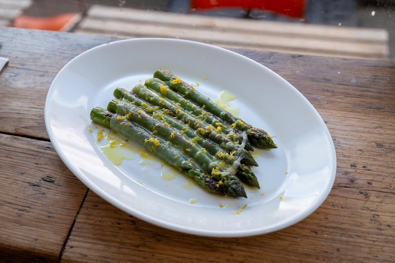 Grilled asparagus from Ultan Walsh’s Gort na Nain farm, served with lardo, lemon zest and olive oil. Photograph: John Allen