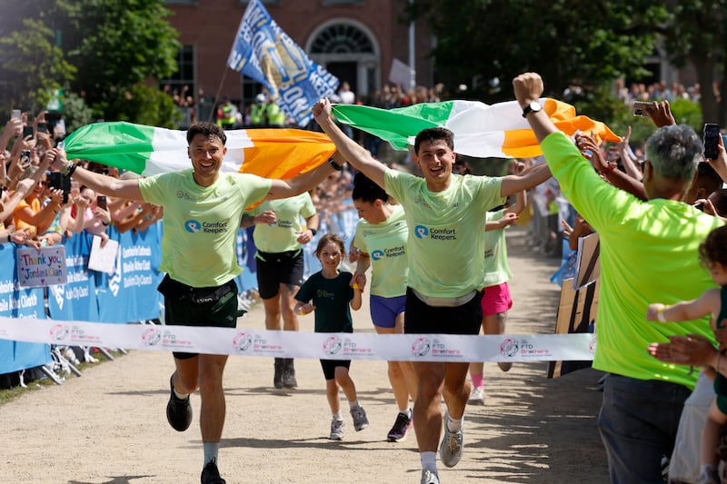 The brothers approach the finish line in Merrion Square. Photograph: Nick Bradshaw