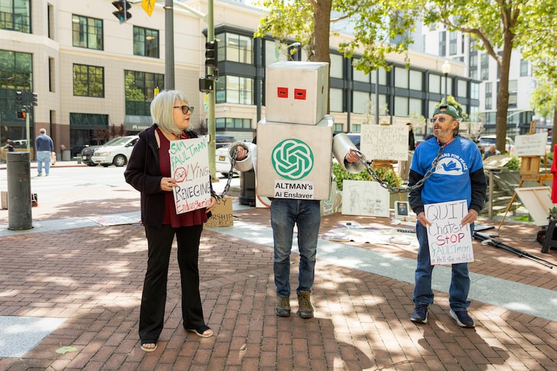 A protest on artificial intelligence outside a courthouse where Elon Musk’s lawsuit against OpenAI was heard. Photograph: Jason Henry/The New York Times
                      