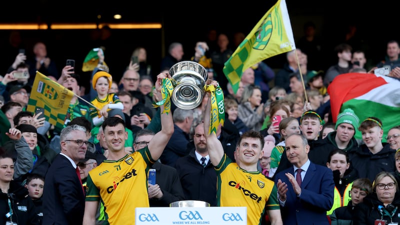 Donegal's joint captains Michael Langan and Shane O'Donnell lift the Mícheál Ó Muircheartaigh Memorial Cup after their NFL Division 1 win over Kerry in March. Photograph: James Crombie/Inpho