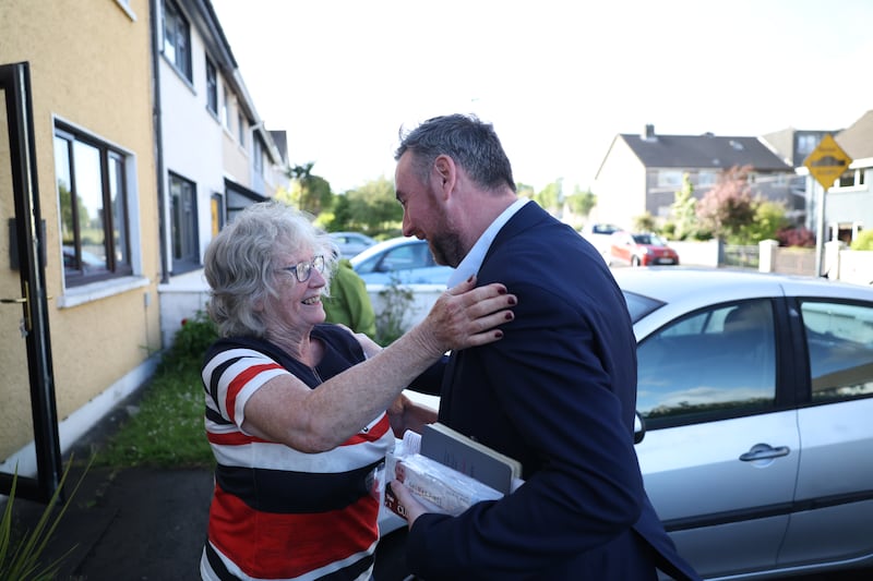 Kathleen Casserley greets Independent councillor Mike Cubbard as he canvasses for votes in the Galway West byelection. Photograph: Enda O'Dowd