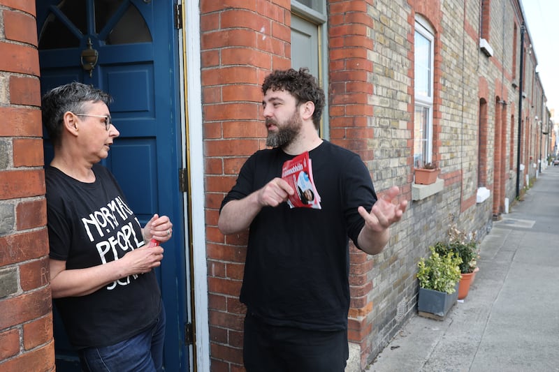 People Before Profit candidate Eoghan Ó Ceannabháin talking to Margaret Lonergan in Stoneybatter, Dublin. Photograph: Dara Mac Dónaill/The Irish Times
