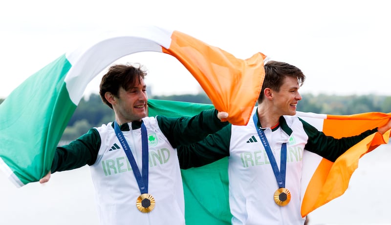 Paul O’Donovan and Fintan McCarthy after winning gold in the men's lightweight double sculls at the 2024 Paris Olympics. Photograph: James Crombie/Inpho