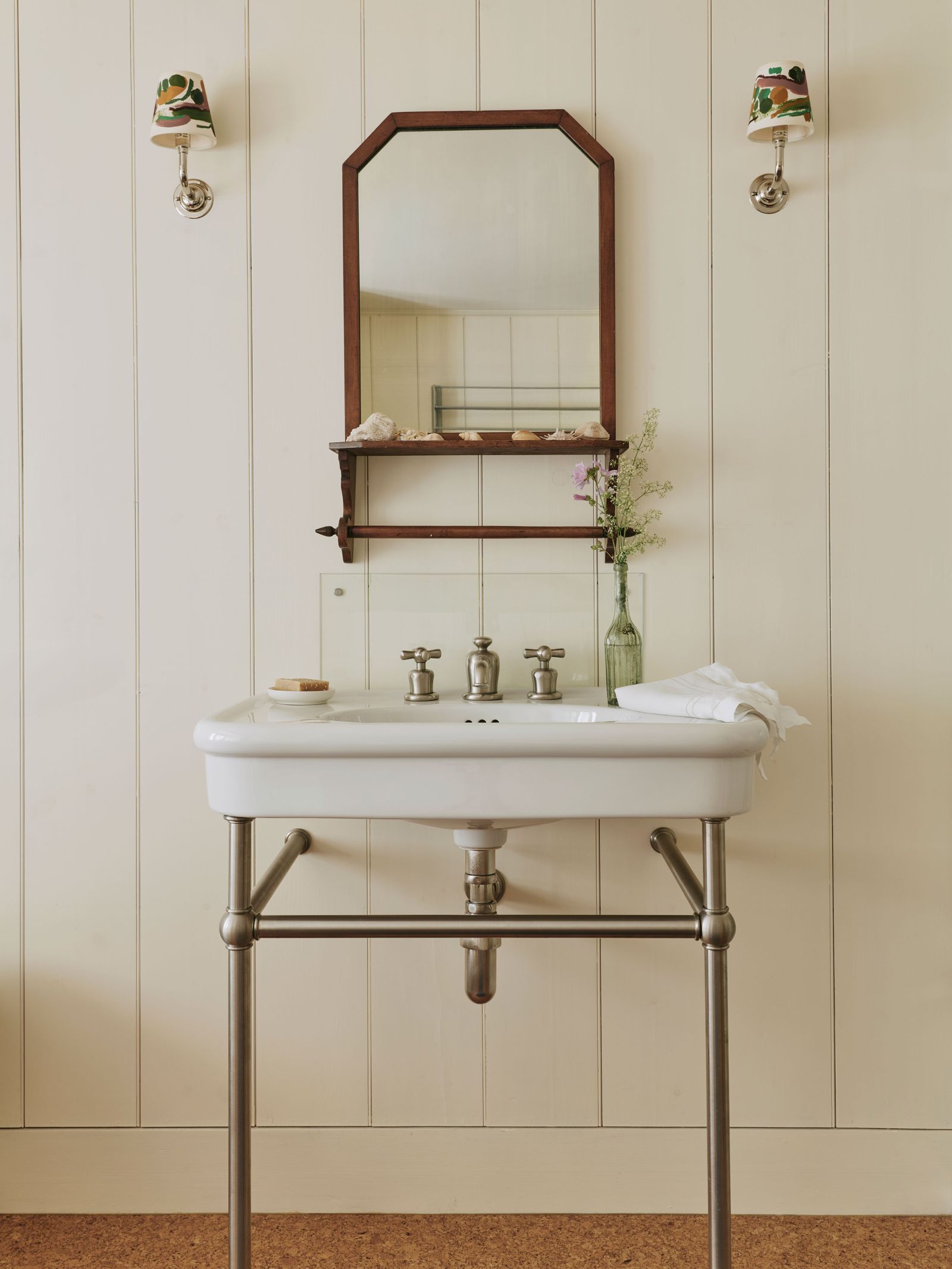Image may contain Sink Sink Faucet Plant and Lamp