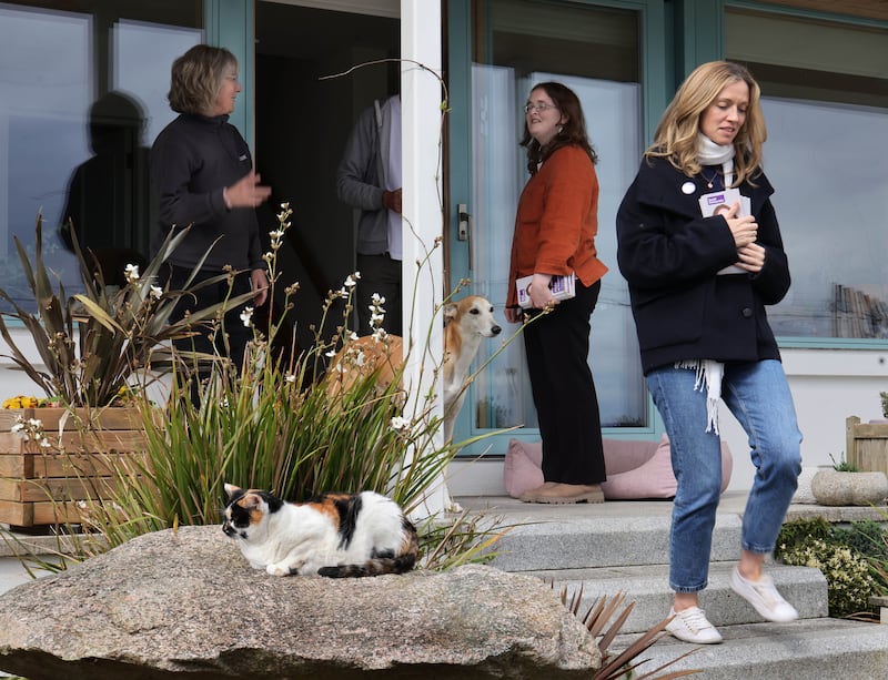Social Democrats candidate for Galway West, Míde Nic Fhionnlaoich (second from right), along with party leader Holly Cairns (right), with Kathy and Mick Dunne while canvassing in Claddagh, Galway. Photograph: Joe O'Shaughnessy