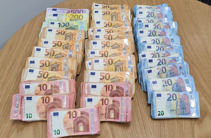 Cash seized during searches across Dublin and Meath by the Criminal Assets Bureau. Photograph: Cab/Facebook