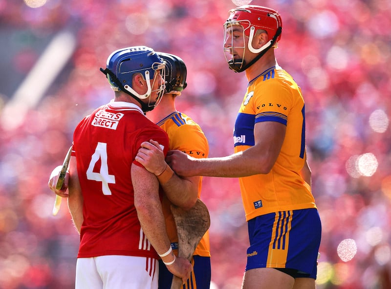 Cork's Seán O'Donoghue with Peter Duggan of Clare at Pairc Ui Chaoimh on Sunday. Photograph: Tom O'Hanlon/Inpho