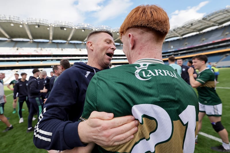 Kerry Manager Tomás Ó Sé celebrates after the game with Jack Joy. Photograph: Laszlo Geczo/Inpho