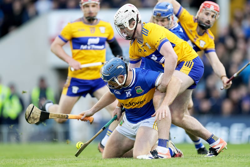 Tipperary's Jason Forde and Adam Hogan of Clare. Photograph: Laszlo Geczo/Inpho