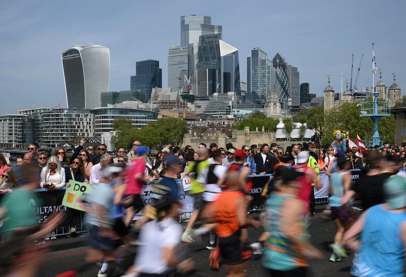 A view of the City of London as athletes cross Tower Bridge during the 2026 London Marathon. Photo by Alex Broadway/Getty Images
