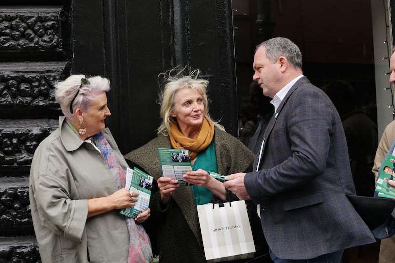 Noel Thomas canvasses Losita Stack and Majella Fahy on Galway's Eglinton Street. Photograph: Alan Betson/The Irish Times