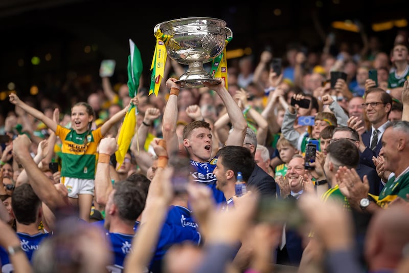 Kerry captain Gavin White lifts the Sam Maguire in 2025 after victory over rivals Donegal. Photograph: Inpho