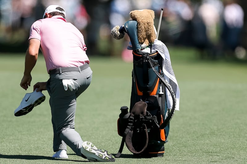 Rory McIlroy adjusts his shoe during the final round of the Truist Championship at Quail Hollow in Charlotte, North Carolina on Sunday. Photograph: Andrew Redington/Getty Images