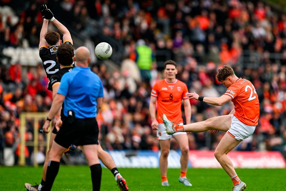 Oisín O'Neill of Armagh kicks a two-point score during the Ulster SFC semi-final against Down at St Tiernach's Park in Clones, Monaghan. Photo by Ramsey Cardy/Sportsfile