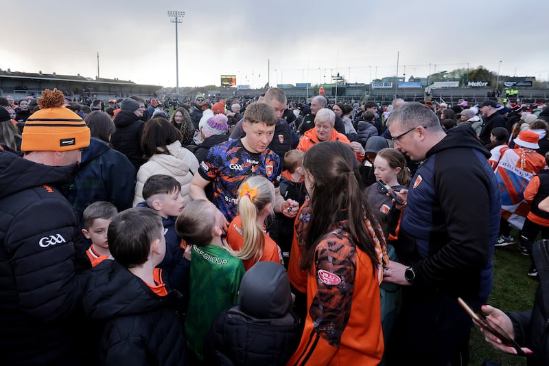 Armagh goalkeeper Blaine Hughes signs autographs after their win over Tyrone last month. Photograph: Laszlo Geczo/Inpho