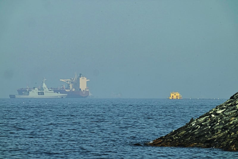 An Emirati patrol boat is seen near a tanker anchored in the Gulf of Oman near the Strait of Hormuz. Photograph: Fatima Shbair/AP