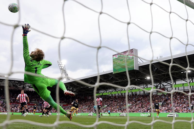 Caoimhín Kelleher in action during his 10th clean sheet of the season for Brentford. Photograph: Adrian Dennis/AFP via Getty Images