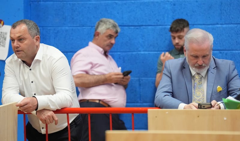 Independent Ireland candidate Noel Thomas with party colleagues Richard O'Donoghue and Ken O'Flynn, as counting continues. Photograph: Niall Carson/PA Wire