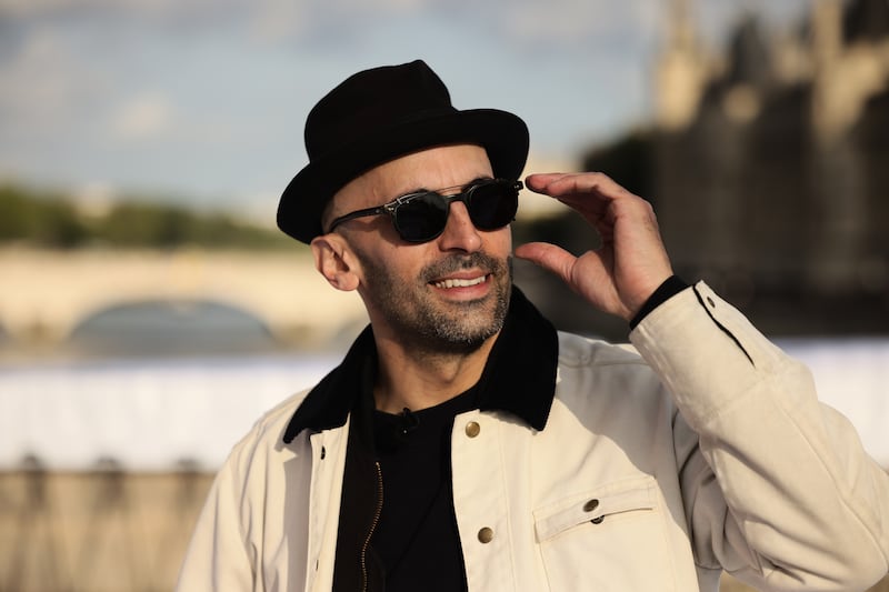 French street artist JR's work tackles social media. Photograph: Thomas Padilla/AP