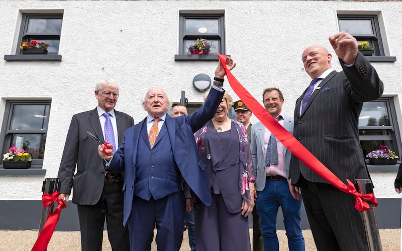 Then-president Michael D Higgins, and his wife Sabina, officially open Jigginstown Manor, a Tiglin facility for vulnerable young adults in Naas, Co Kildare, with Aubrey McCarthy (right), chair of Tiglin, and John Craddock, chair Homeless Care (left),  in June 2022. Photograph: Colin Keegan/Collins Dublin