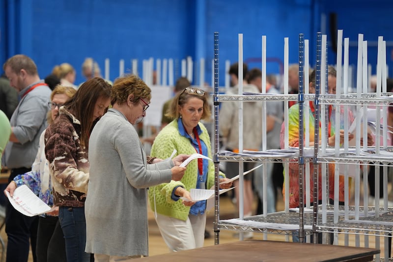 Ballot papers are sorted as counting resumes for the Galway West byelection at the Galway Lawn Tennis Club, Salthill. Photograph: Niall Carson/PA Wire