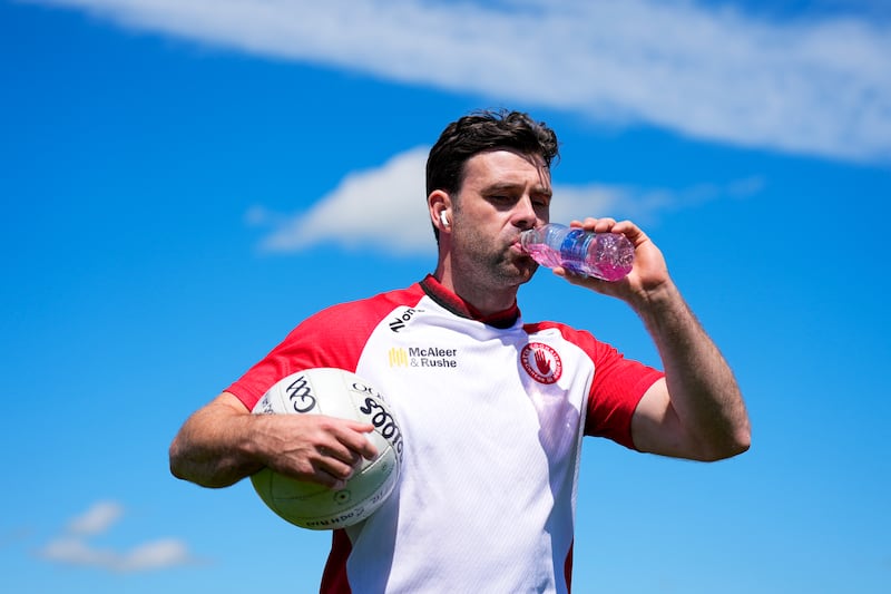 Darren McCurry gets the fluids on board on a hot day ahead of Roscommon-Tyrone at Dr Hyde Park.
Photograph: James Lawlor/Inpho
