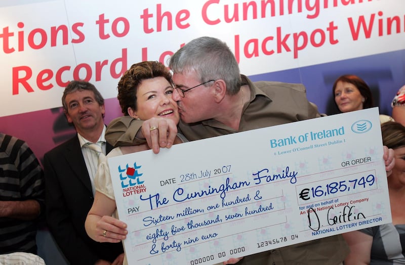 Paul and Helen Cunningham, from Fairhill, Cork, collect a cheque for what was then a record jackpot prize of more than €16.1m in August 2007. Photograph: Eric Luke