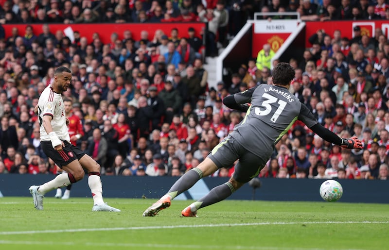Cody Gakpo scores Liverpool's second goal during the game at Old Trafford. Photograph: Michael Regan/Getty Images