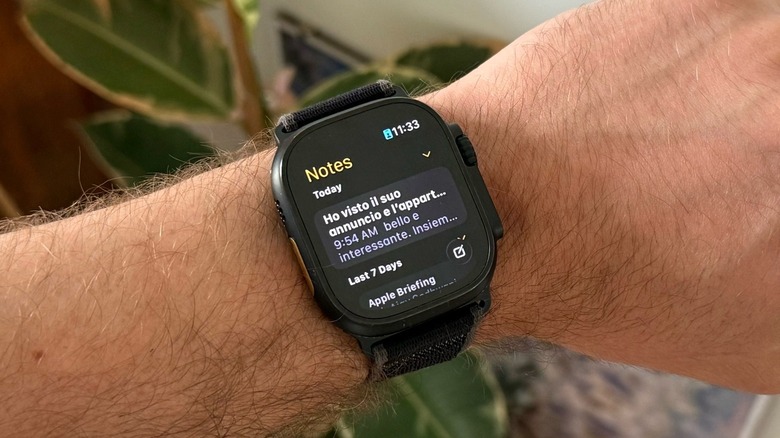 An Apple Watch Ultra 2 on a man's wrist showing notes