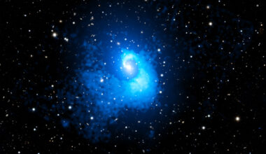 On a dark background, galaxies are shown as fuzzy white dots.
	  A bright blue spiral expands from the center.
	  Clicking on the picture will download the highest resolution
	  version available.