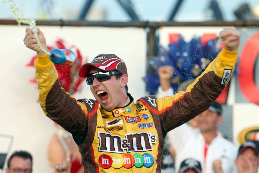 Kyle Busch celebrates in Victory Lane after a Cup Series win in Las Vegas in 2009.