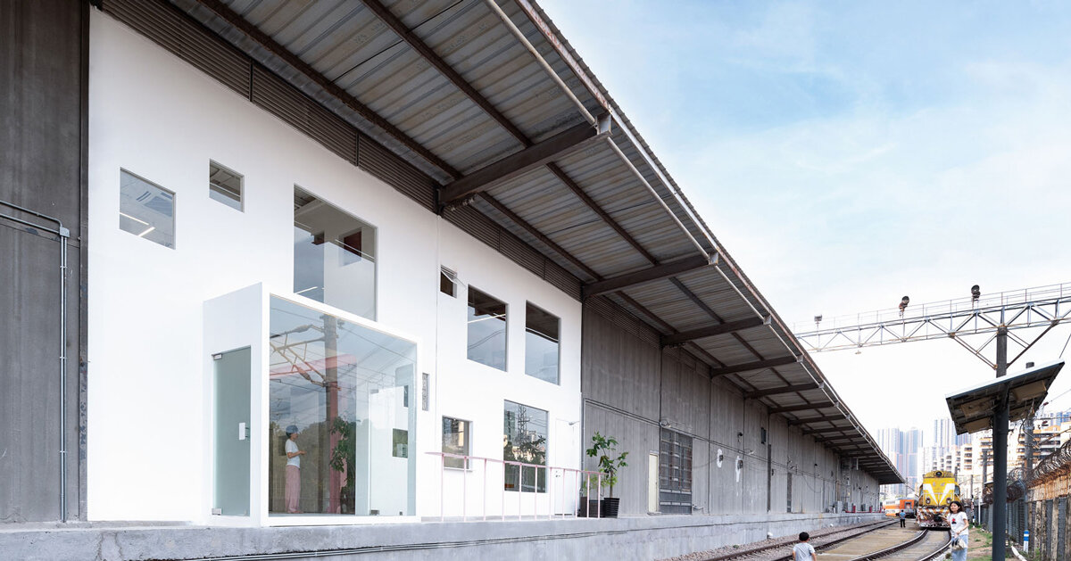 layered transparent walls transform former railway warehouse in shenzhen