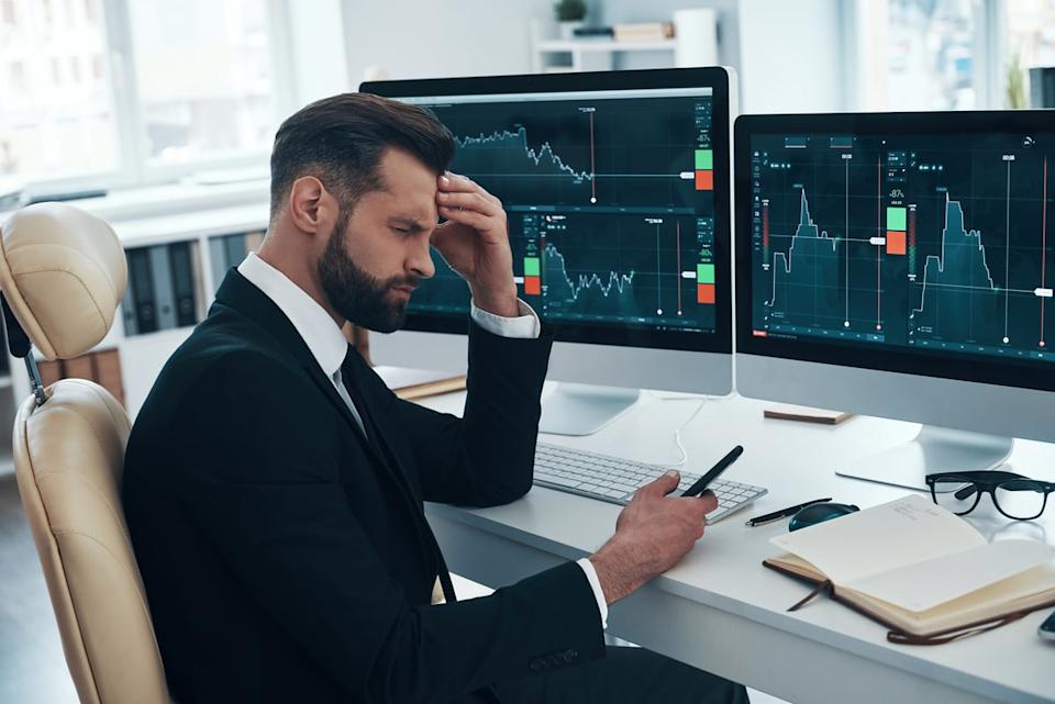 Person with a headache tracking charts.