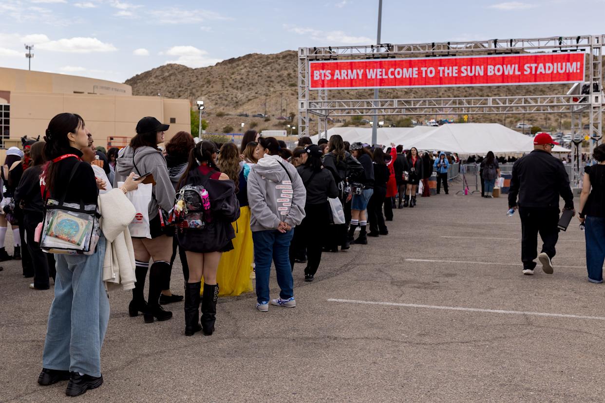 BTS fans wait in the VIP line outside the Sun Bowl in El Paso, Texas, on Saturday, May 2, 2026, before the first concert.
